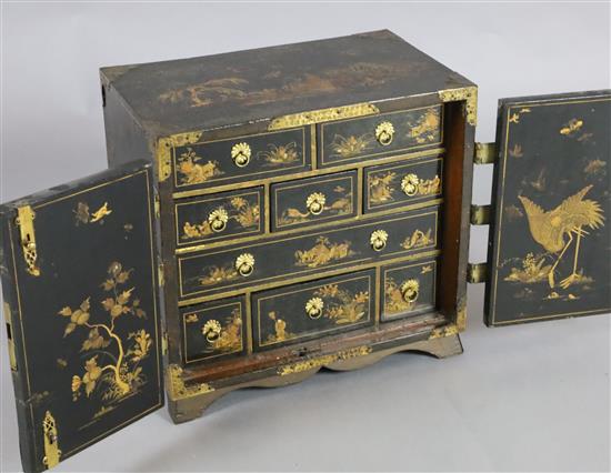 An early 18th century japanned table cabinet, H. 16in., W. 17.5in, later apron stand